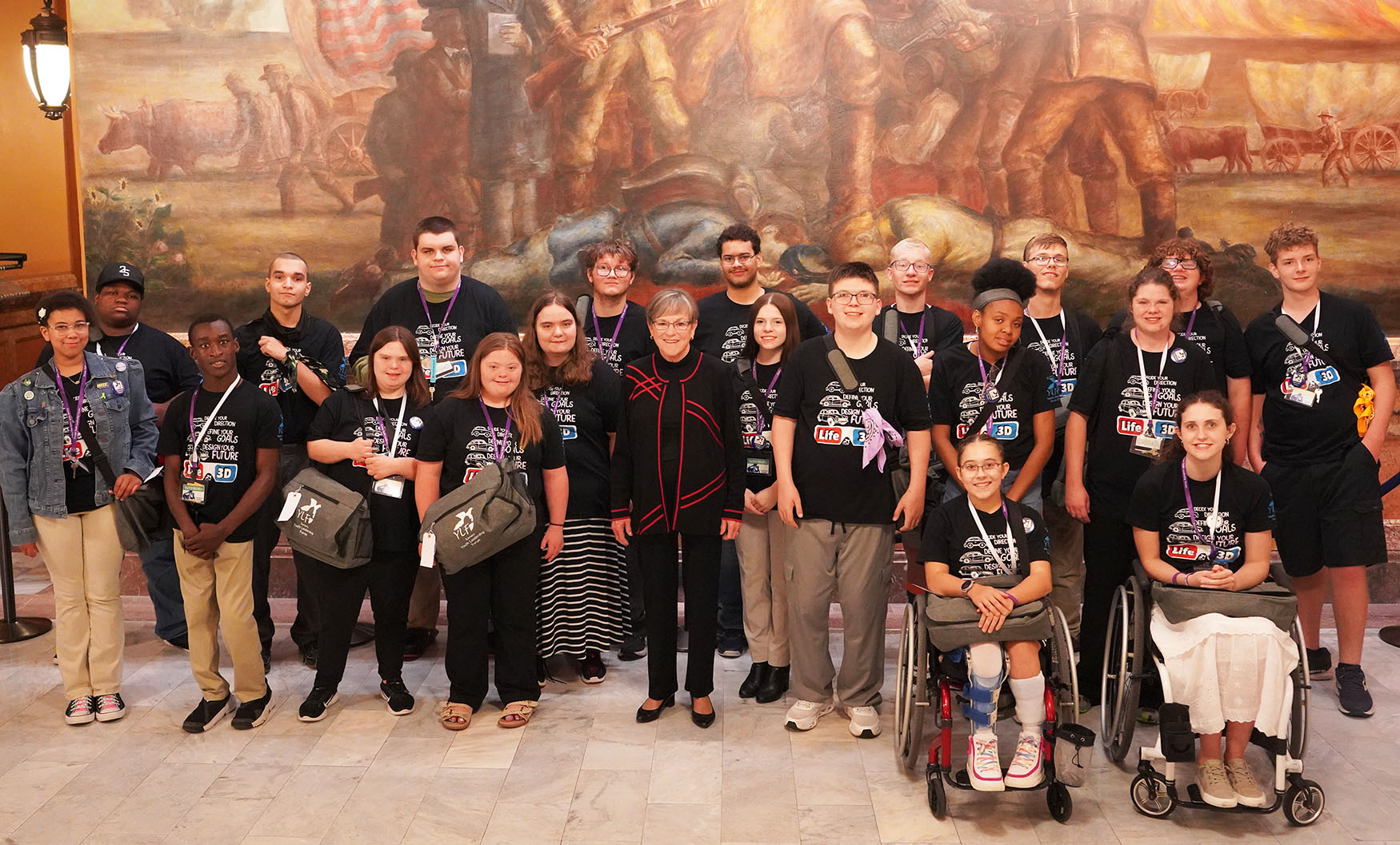 The 2025 KSYLF delegates take a photo in the State Capital rotunda with Governor Laura Kelly